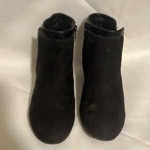 Woman’s black booties